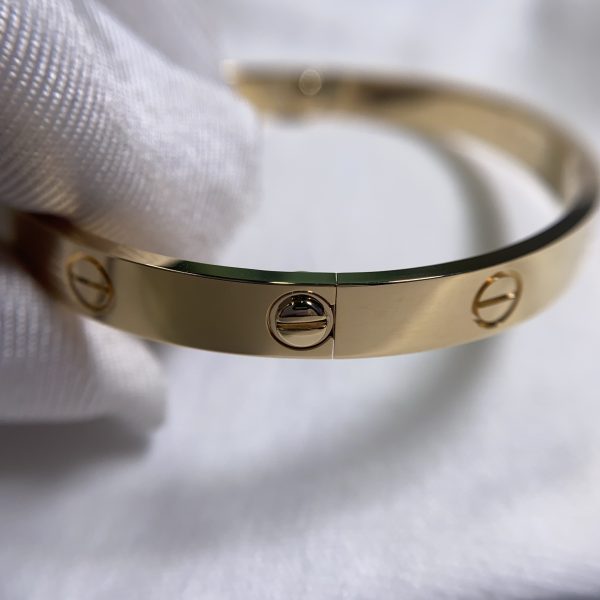 Fake cartier love bracelet real gold